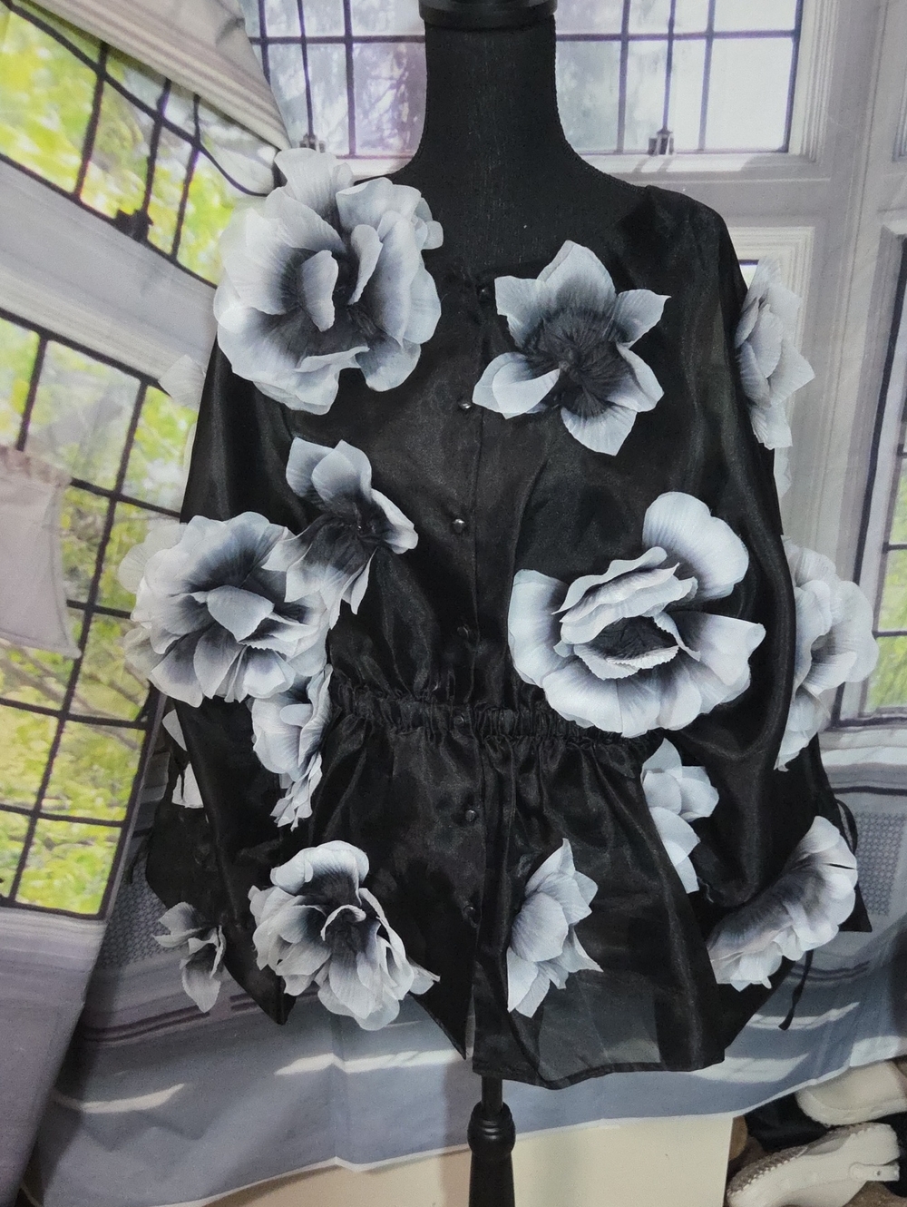 AKIRA Dark Bloom Chiffon Blouse With Large White And Black Floral Appliqués
